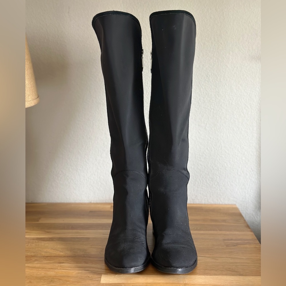 Donald Pliner black microfiber riding boot with suede trim.